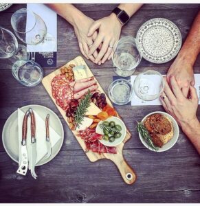 small family business - platter of food with wine